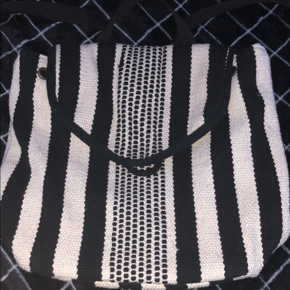 Black and white stripped medium backpack